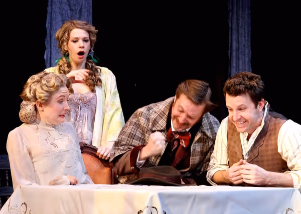 Jon Barker as actor Ferdinand Gadd celebrates his new role surrounded by fellow actor Photo