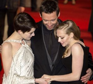 Anne Hathaway, Hugh Jackman and Amanda Seyfried. Photo Credit: Richard Young/Rex Photo