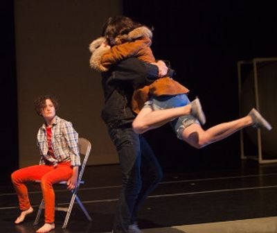 Matthew Dieckman and Julie Hammond enjoy a sweet moment as Faith Helma looks on. Phot Photo
