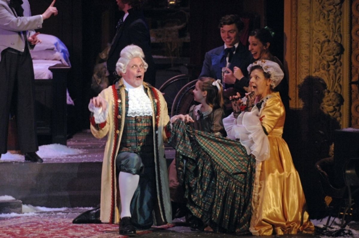 Tim Hartman and Terry Wickline as Mr. and Mrs. Fezziwig and the Cast at 