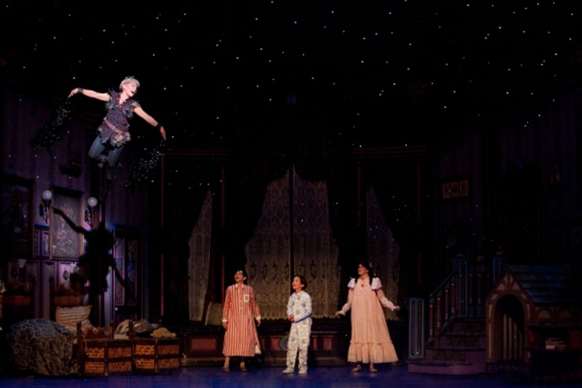 Cathy Rigby as Peter Pan shows the Darling children how to fly. at 
