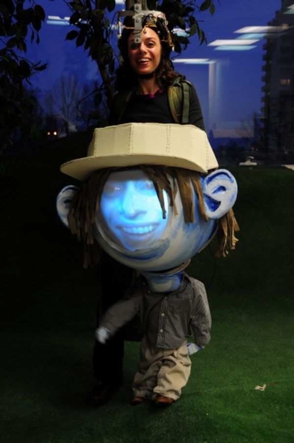 Puppeteer Caroline Tamas as Big Headed Toddler video puppet Photo