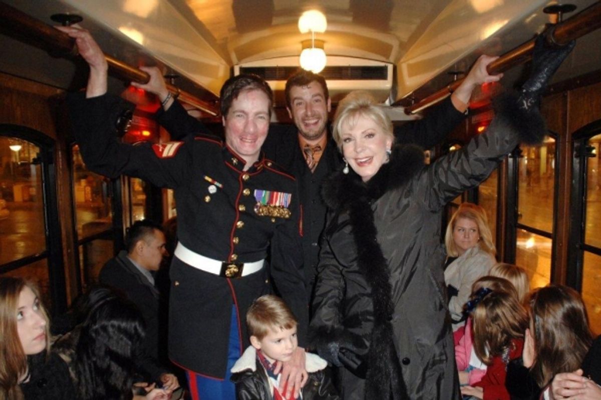 On the trolley USMC Cpl Aaron Mankin, Travis Coursey, Patricia Kennedy at 