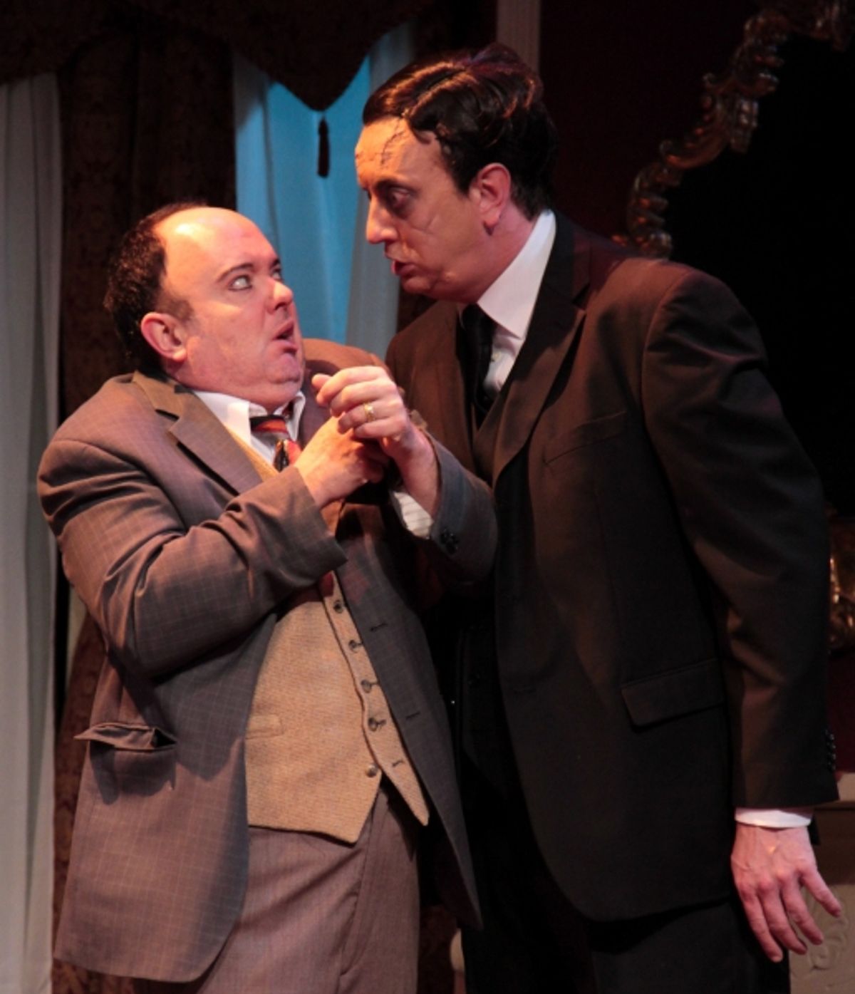 Jonathan Brewster (Jeff Stockberger), right, demands that plastic surgeon Dr. Einstein (Eddie Curry) give him a new face. at 