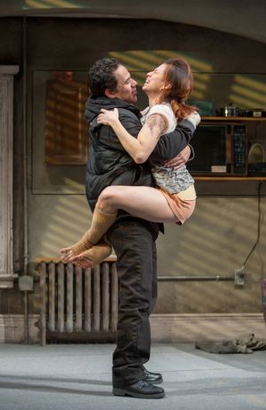 Veronica (Sandra Delgado) leaps into Jackie's (John Ortiz) arms when he tells her that he found a job @ BroadwayWorld Veronica (Sandra Delgado) leaps into Jackie's (John Ortiz) arms when he tells her tha Photo