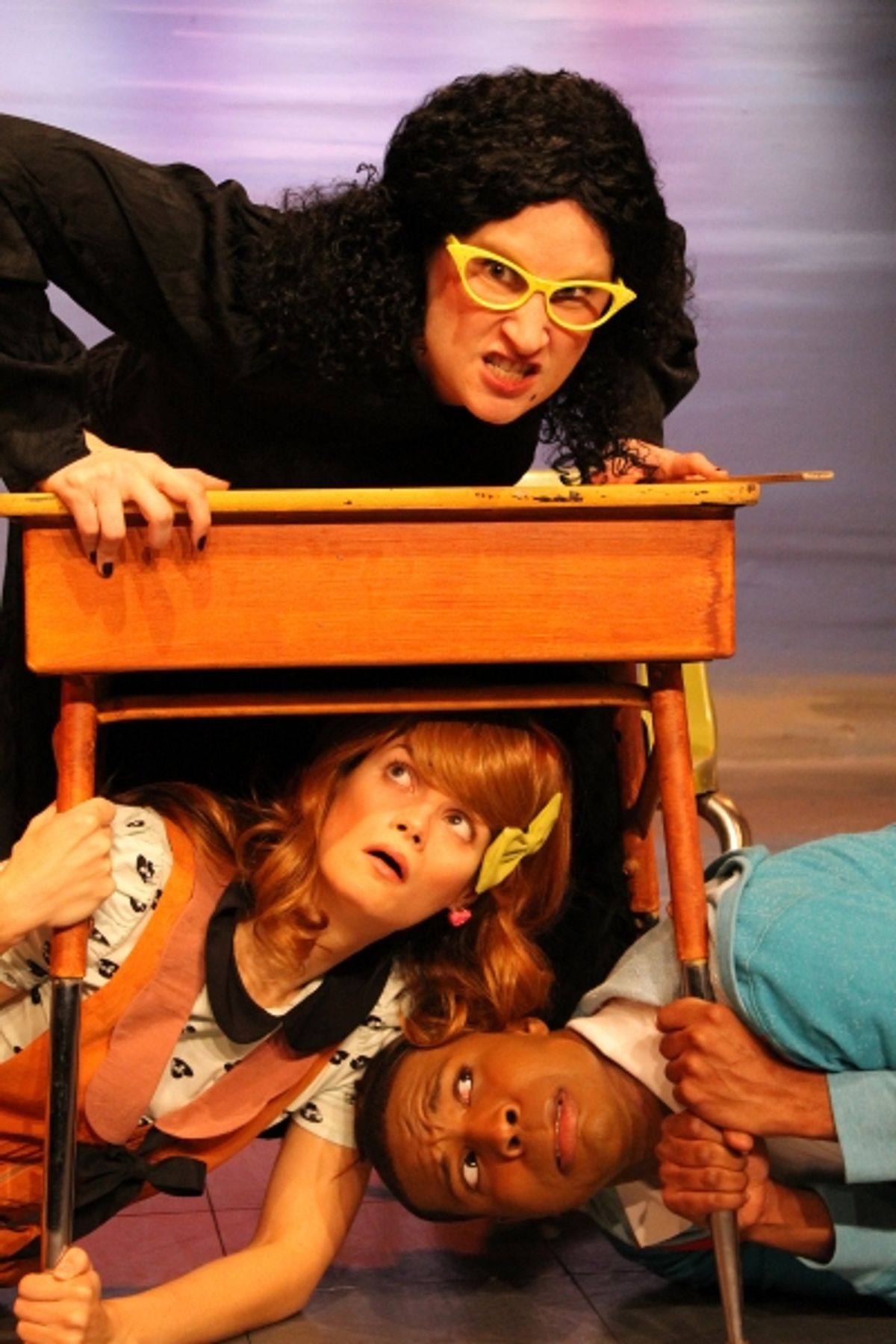 Viola Swamp (Katie Harrison) and her terrified students (Jessica Knapp and Chioke Coreathers) at 