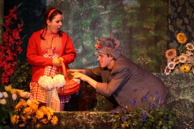 Meredith Deighton (Little Red Riding Hood) catches Benjamin Deman (Wolf) trying to st Photo