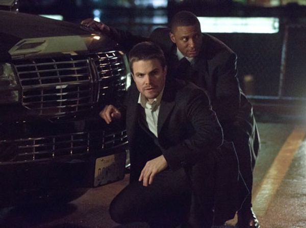 Stephen Amell, David Ramsey  Photo