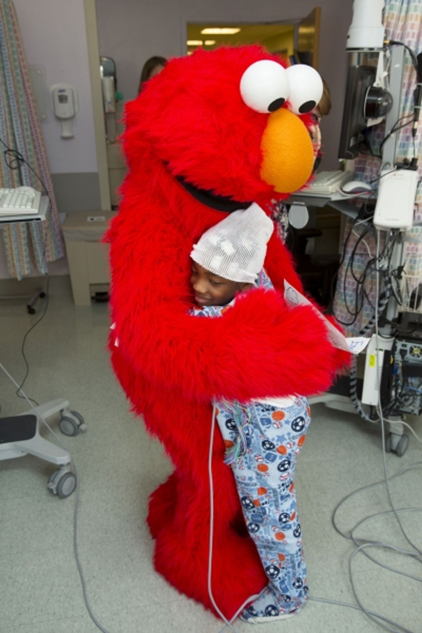 Photo Flash: Elmo and Garden of Dreams Foundation Celebrate NYU Tisch Pediatric Ward Reopening Photo Flash: Elmo and Garden of Dreams Foundation Celebrate NYU Tisch Pediatric Ward Reopening Image