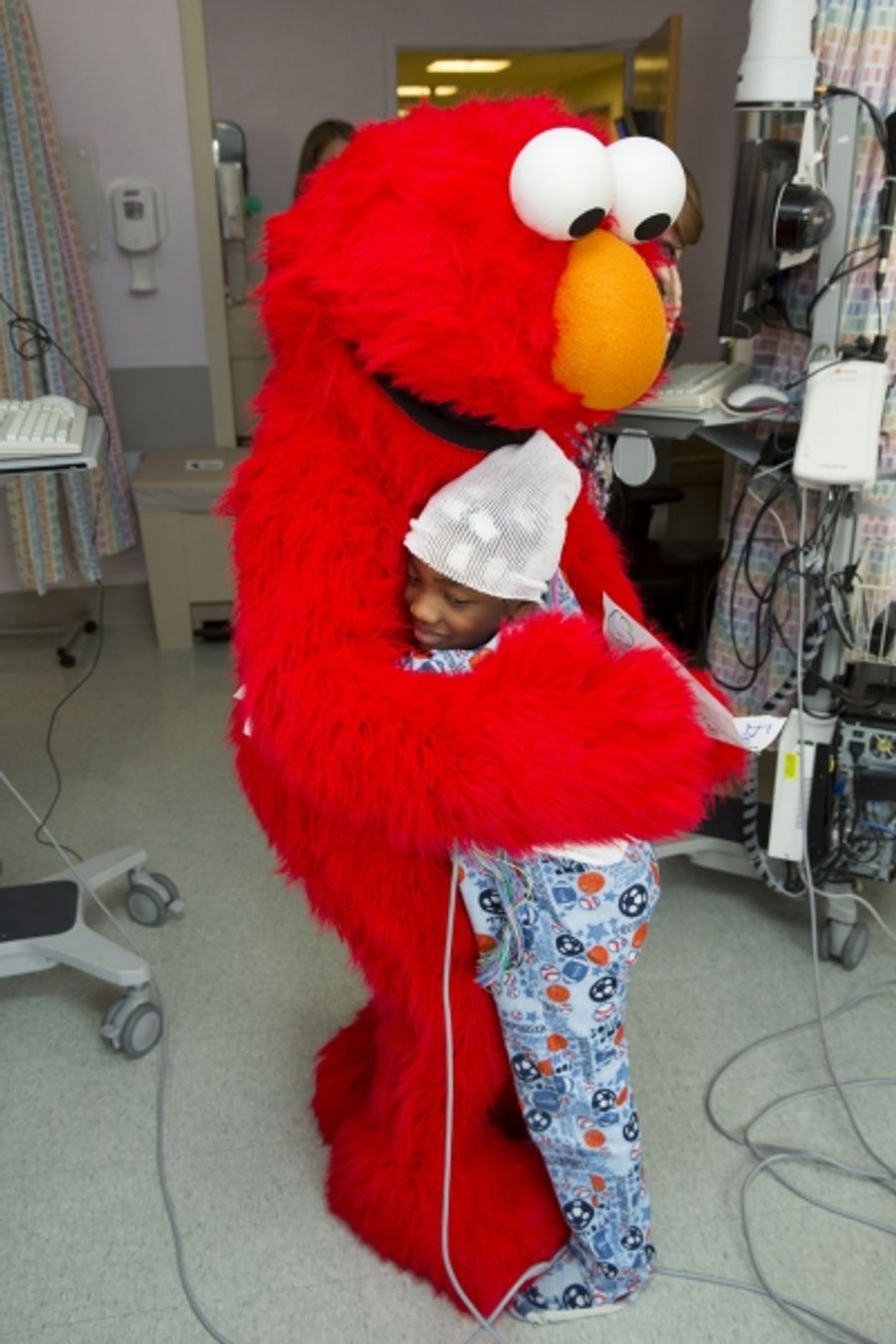 Photo Flash: Elmo and Garden of Dreams Foundation Celebrate NYU Tisch Pediatric Ward Reopening Image