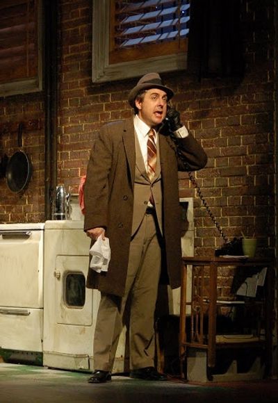 ERIC ROLLAND as  Carlino Photo