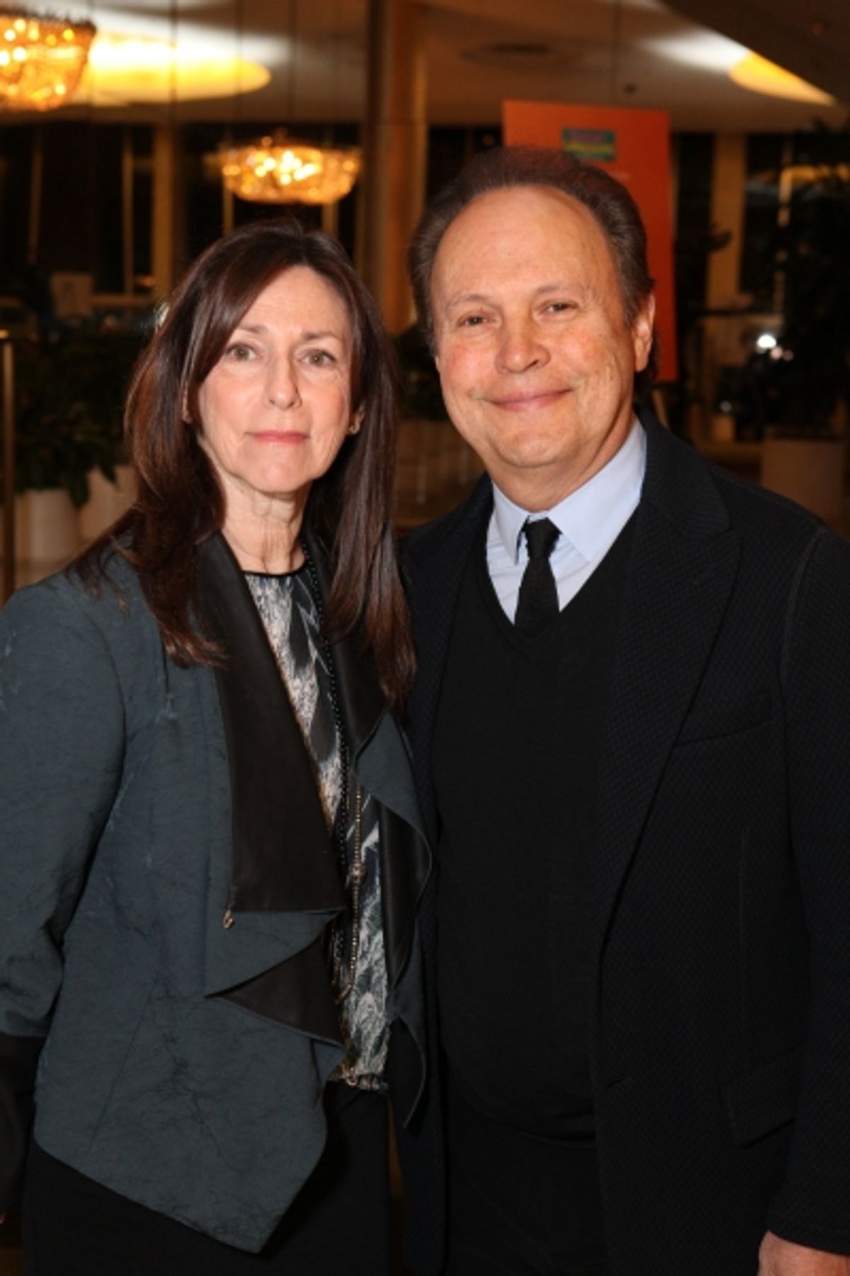 From left, Janice Crystal and actor Billy Crystal pose during a reception for a staged reading of 'Enter Laughing, The Musical' to benefit Center Theatre Group at the Mark Taper Forum on Monday, January 28, 2013 in Los Angeles, Calif. (Photo by Ryan Mille at 