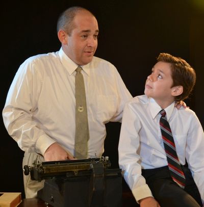Parker Ballentine (John Mitsakis) teaches son John ( Raven Nicholson) about the facts Photo
