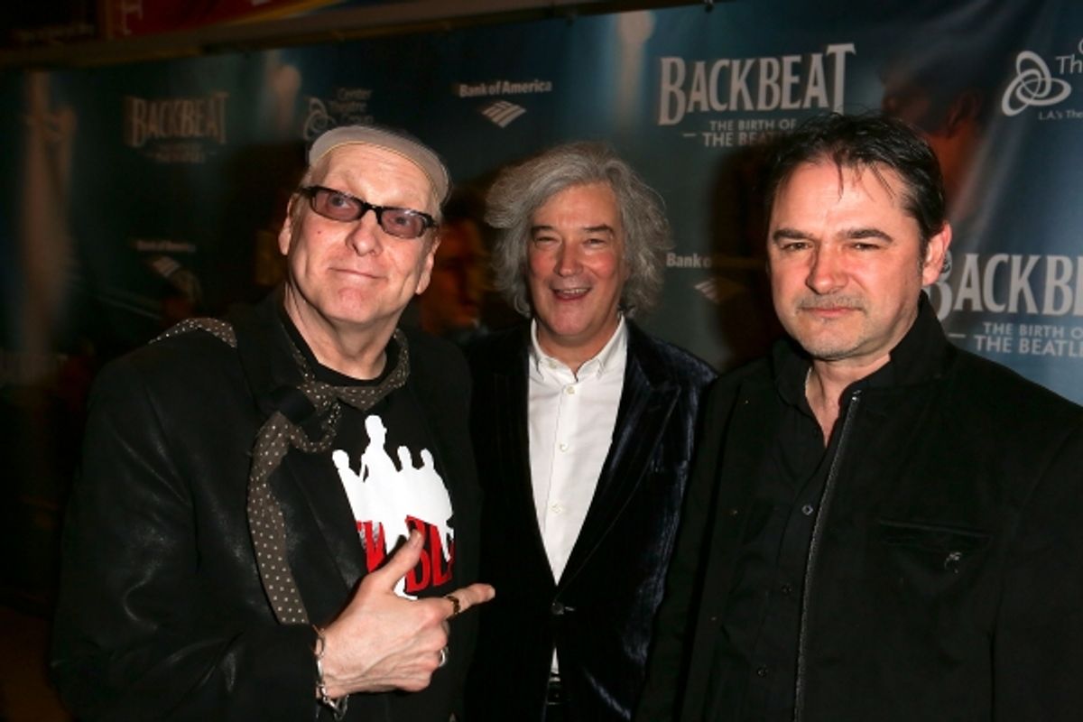From left, musician Rick Neilsen of Cheap Trick, 'Backbeat' Producer Karl Sydow and 'Backbeat' Music Supervisor Paul Stacey pose during the arrivals for the opening night performance of 'Backbeat' at the Center Theatre Group/Ahmanson Theatre on Wednesday, at 