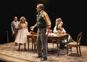 (center) Stanley (ensemble member Ian Barford) celebrates his birthday with (left to right) McCann (Marc Grapey), Meg (ensemble member Moira Harris), Lulu (Sophia Sinise) and Goldberg (ensemble member Francis Guinan) @ BroadwayWorld (center) Stanley (ensemble member Ian Barford) celebrates his birthday with (left to Photo