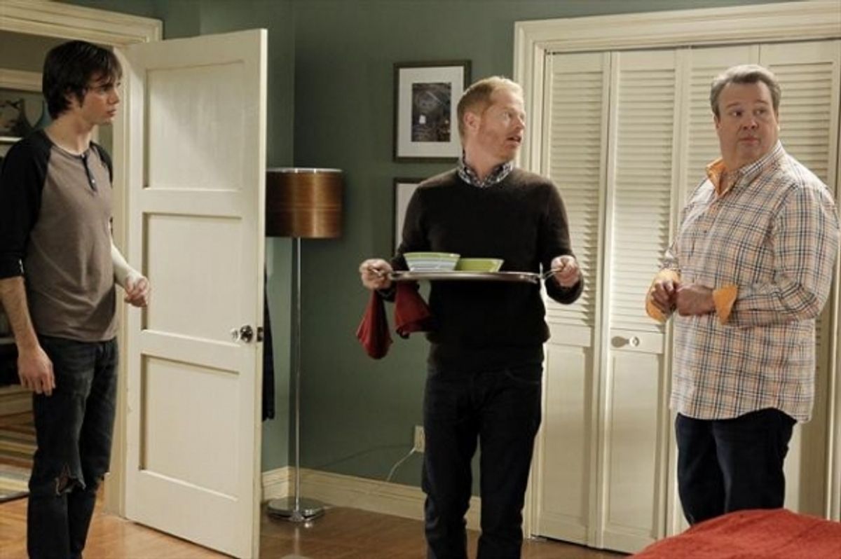 REID EWING, JESSE TYLER FERGUSON, ERIC STONESTREET at 