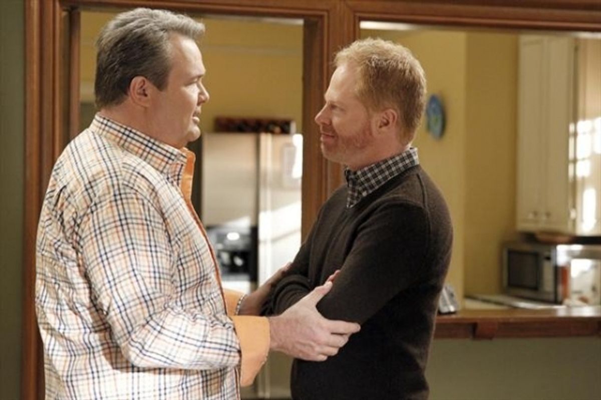 ERIC STONESTREET, JESSE TYLER FERGUSON at 