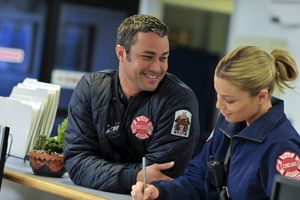 Taylor Kinney, Lauren German Photo