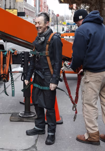 Alan Cumming gearing up Photo