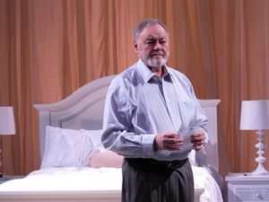 An elderly American businessman (Jack Davidson) retreats to London for a respite in a Photo