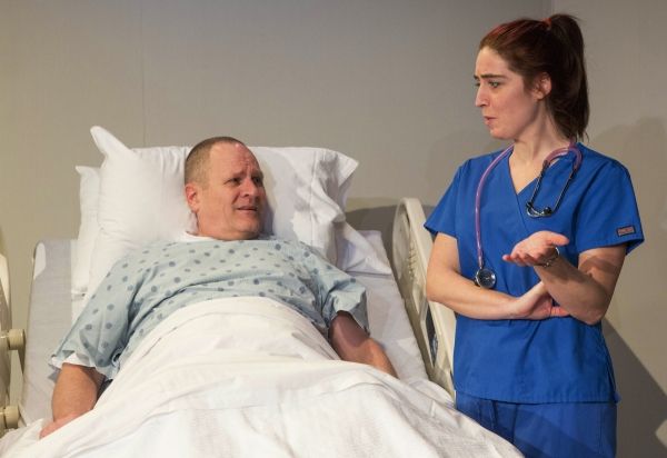Dying patriarch Curtis Lyons (Charles Goad) tries to get along with his nurse (Merced Photo