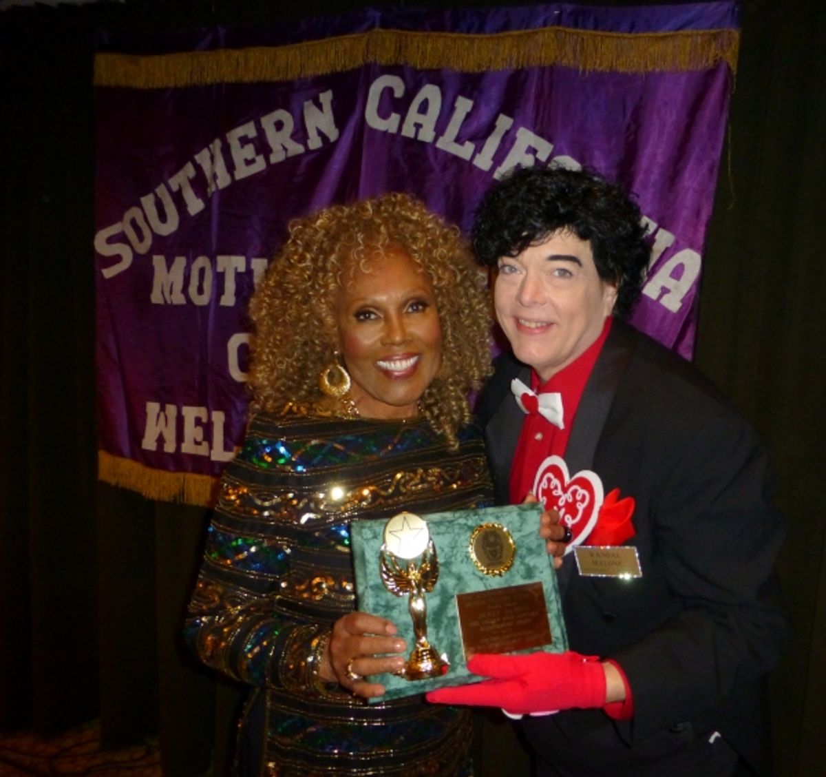 Ja'net BuBois is awarded the 'Outstanding achievement in music' award by Randal Malone at 