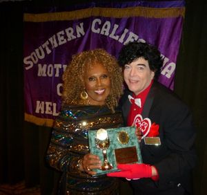 Ja'net BuBois is awarded the "Outstanding achievement in music" award by Randal Malon Photo