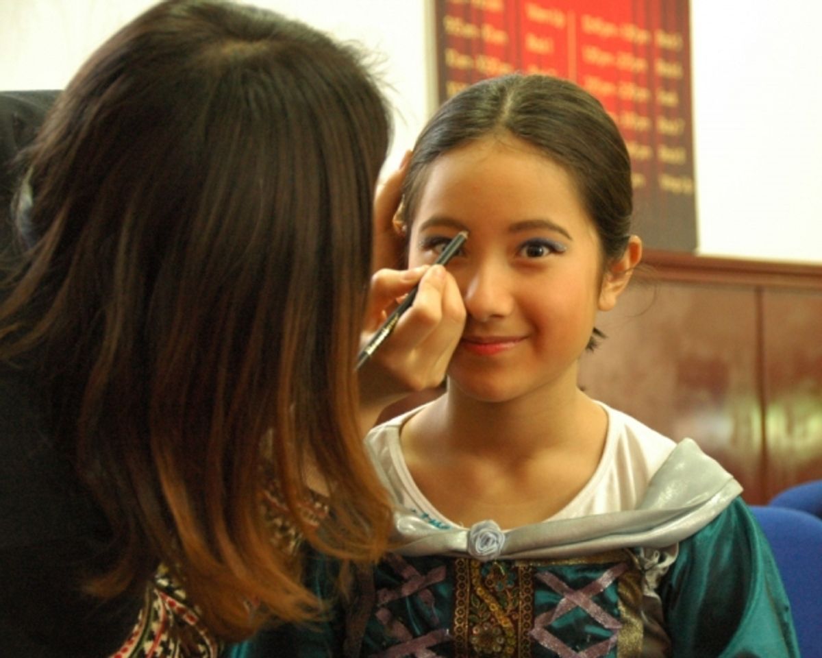 Katherine Johnson getting into makeup as Guinevere at 