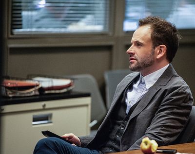 "Deja Vu All Over Again"--  Sherlock (Jonny Lee Miller) is intrigued by the subway mu Photo