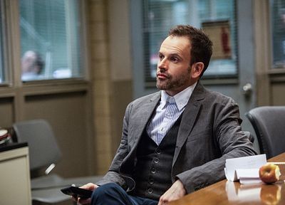 "Deja Vu All Over Again"--  Sherlock (Jonny Lee Miller) is intrigued by the subway mu Photo