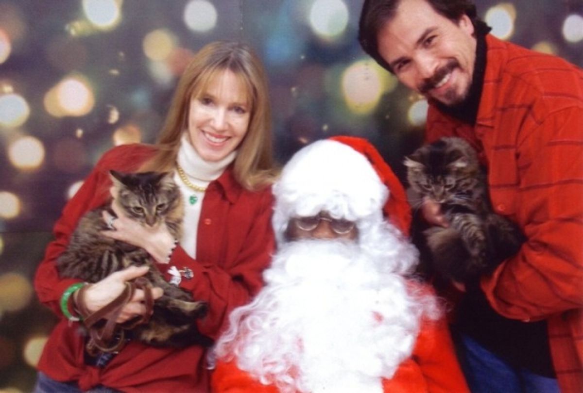 Kevin Gray and Dodie Petitt with Santa and their children at 