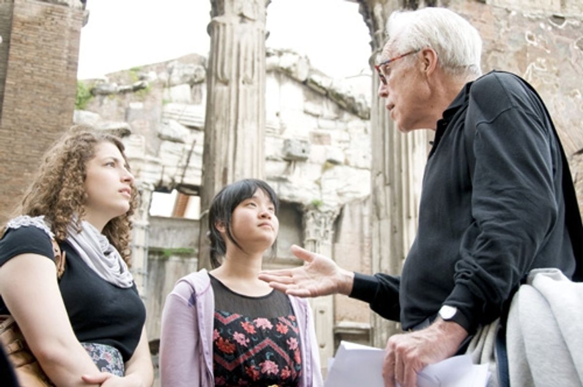 Caroline Durlacher, Sharon Jan & John Guare discuss Roman theater outside the Teatro Marcello in Rome, Italy at 