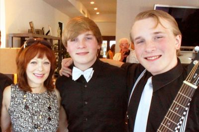 Frances Fisher and two young party performers Photo
