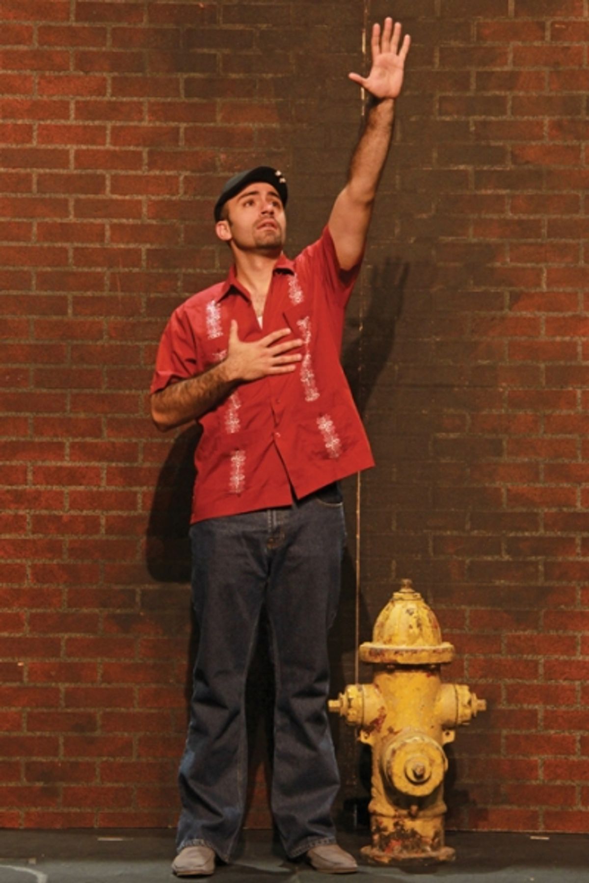 Nick Duckart as Usnavi in Actors' Playhouse's production of In the Heights. Photo Credit: Alberto Romeu at 