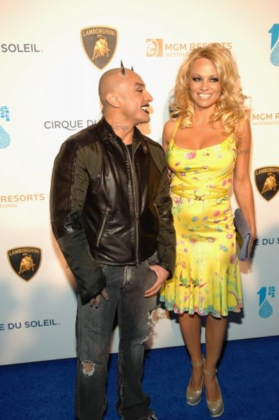 Performer Jesus Villa and actress Pam Anderson Photo