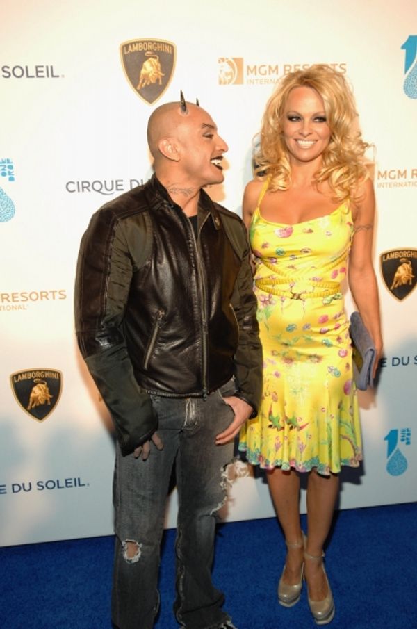 Performer Jesus Villa and actress Pam Anderson Photo