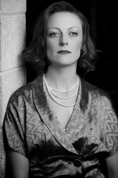 Rebecca Herrick as Carol in Outside Job Photo