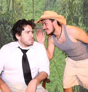 Shannon (Scott McWirter) listens terrified as Pancho (Jose Rivera) is glad to whisper Photo