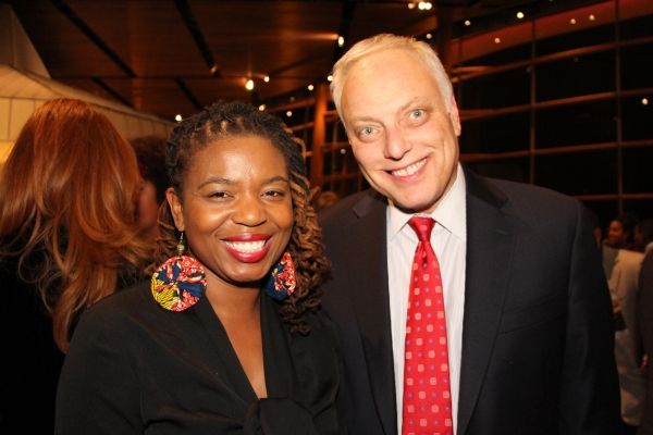 Playwright Katori Hall and board member Mark Shugoll Photo