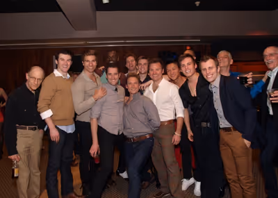 Members of the cast with Director Glenn Casale Photo