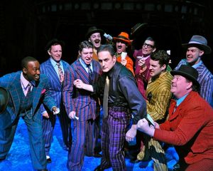 Gary Lynch (center, as Sky Masterson) and ensemble perform "Luck Be A Lady."Allie Sch Photo