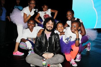 Performers from 'Uniquely Made' of Children's Aid Society with drummer Fabrizio Moret Photo