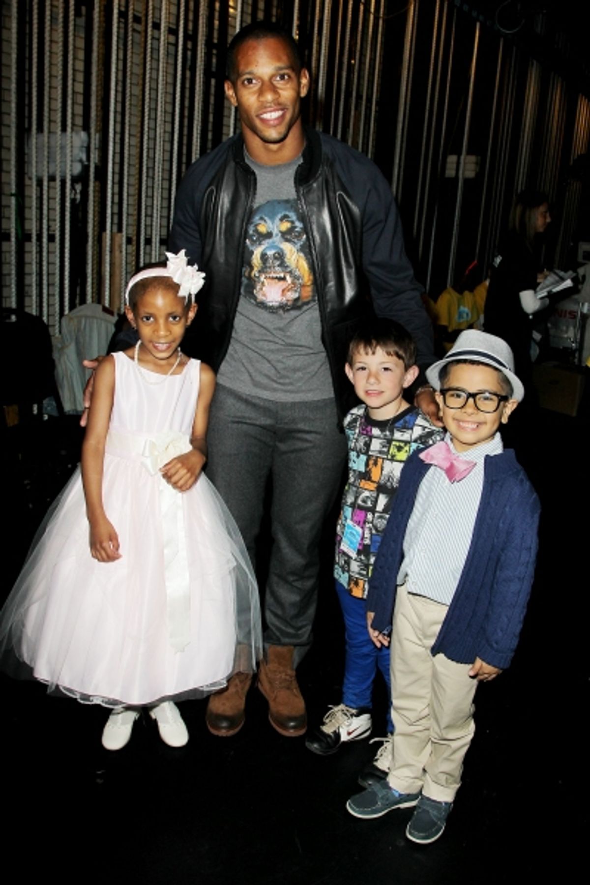 Performer Julianna Pierre of Maria Fareri Children&acirc;&euro;s Hospital with NY Giants wide receiver Victor Cruz and fellow performers Nicholas Anderson and Malik Naser of Make-a-Wish Foundation of New Jersey at 