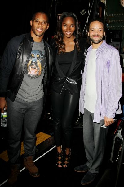 NY Giants wide receiver Victor Cruz with Sports Illustrated swimsuit model Damaris Le Photo