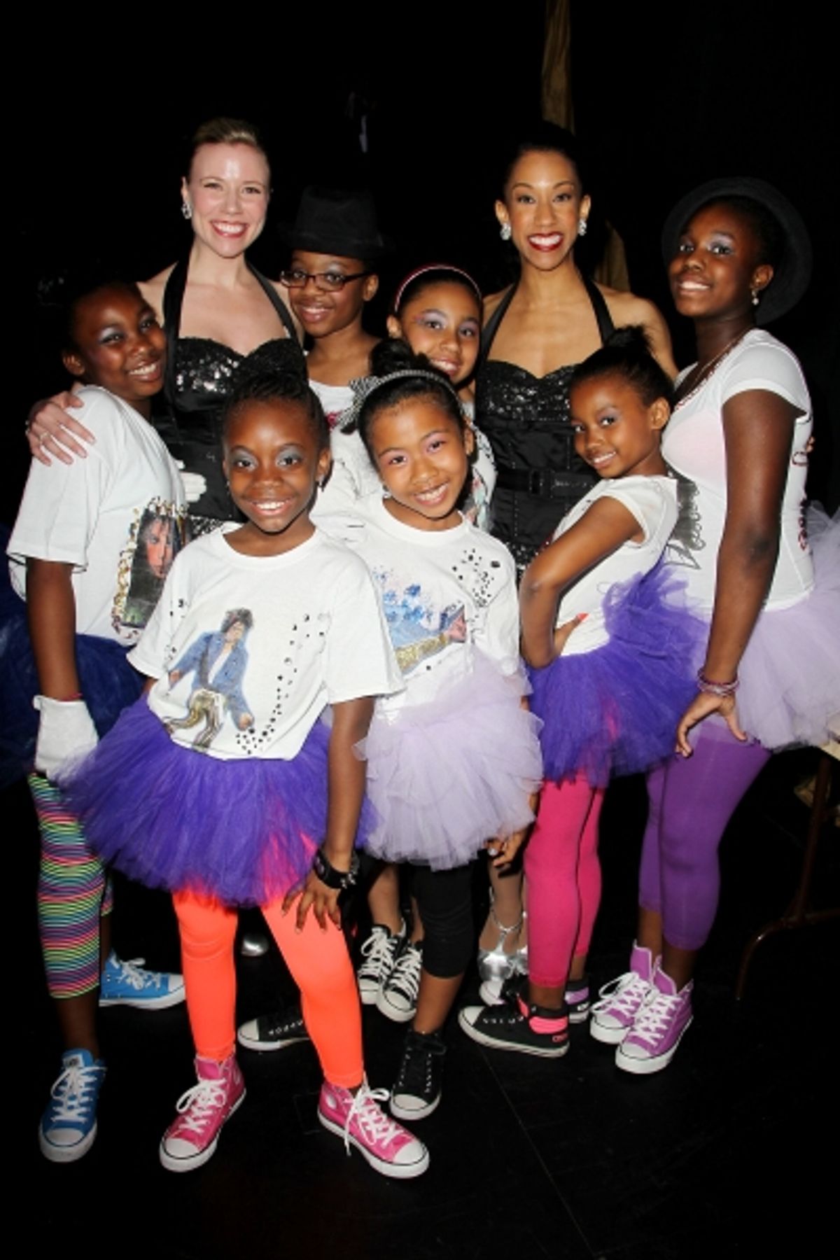 Performers from 'Uniquely Made' of Children's Aid Society with Rockettes Tara Dunleavy (L) and Karilyn Surratt at 