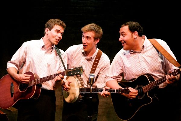 Brendan Willing James as The Poet, Justin Flagg as The Lonesome Traveler, and Nichola Photo