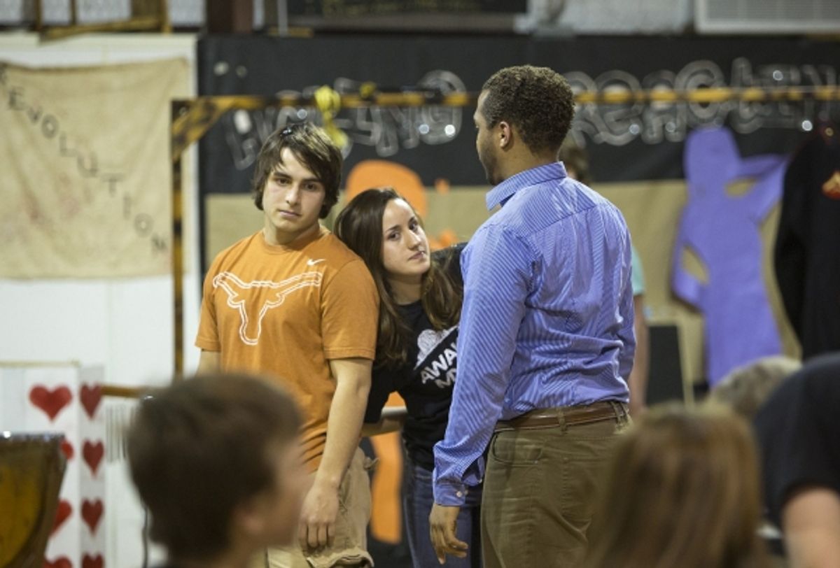 Students and Phillip Taylor, director at Rogers High School, at an intense rehearsal. at 