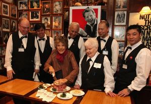 Dena Kaye (center) cuts the first Danny Kaye Deli Club to commemorate Danny Kaye's Centennial at the Carnegie Deli. @ BroadwayWorld Dena Kaye (center) cuts the first Danny Kaye Deli Club to commemorate Danny Kaye's Ce Photo