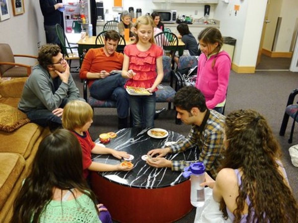 Young actors Zoe Heiden (Young Cosette), Abigail Scott (Young Eponine), Maggie Scott (Young Cosette), Zachary Brown (Gavroche) and Brigham Inkley (Gavroche) lead a tournament of Spot It in the Green Room at 