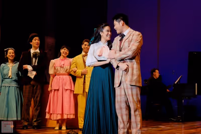 (Center) Jaygee Macapugay, Karl Josef Co and the cast of HELLO, DOLLY! Photo